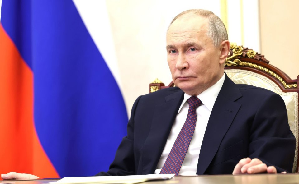 Vladimir Putin chairs a meeting in Moscow.