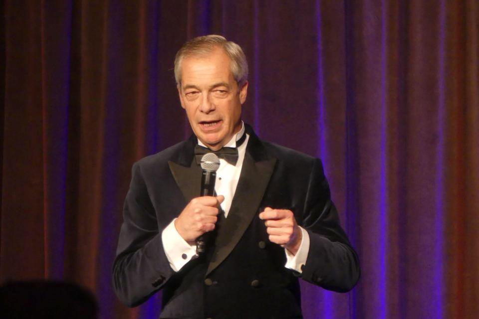 Nigel Farage speaking at an event.
