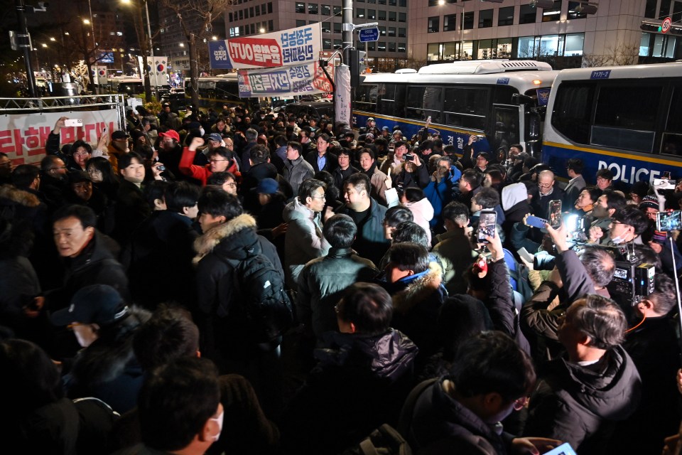 Crowds continue to gather after South Korea's opposition leader urged people to join protests against the martial law
