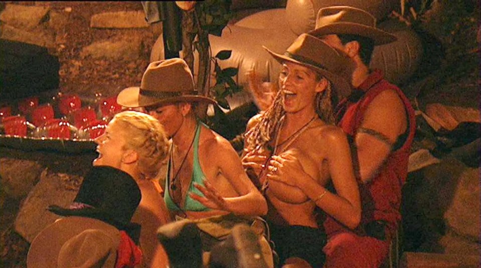 Mandatory Credit: Photo By REX FEATURES PETER ANDRE GIVING JORDAN A MASSAGE, WHO IS GIVING ALEX BEST, WHO IS GIVING KERRY MCFADDEN A MASSAGE ‘I’M A CELEBRITY, GET ME OUT OF HERE’ TV PROGRAMME, AUSTRALIA – 31 JAN 2004 NO MERCHANDISING EDITORIAL USE ONLY