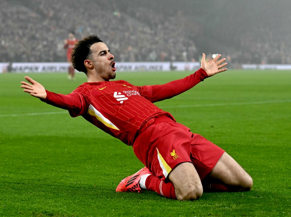 Liverpool's Curtis Jones celebrates scoring a goal.