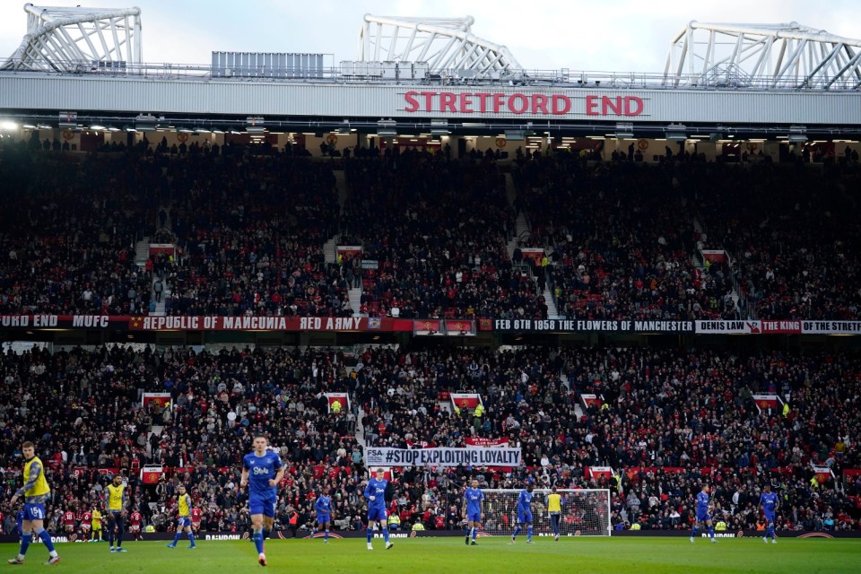 Manchester United's fans show a banner during the English Premier League soccer match between Manchester United and Everton at the Old Trafford stadium in Manchester, England, Sunday, Dec. 1, 2024. (AP Photo/Dave Thompson)