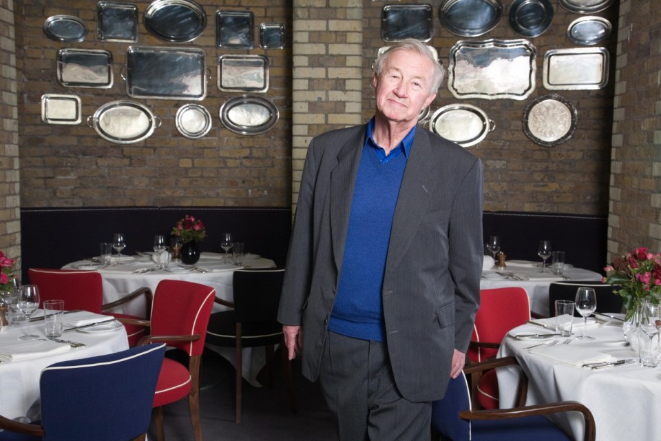 Sir Terence Conran in a restaurant.