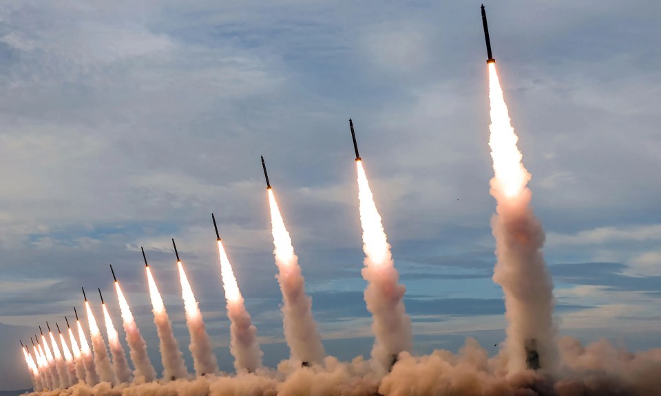 Test firing of multiple 600mm rockets in North Korea.