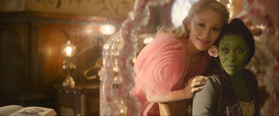 Ariana Grande as Glinda and Cynthia Erivo as Elphaba in a still from the film *Wicked*.