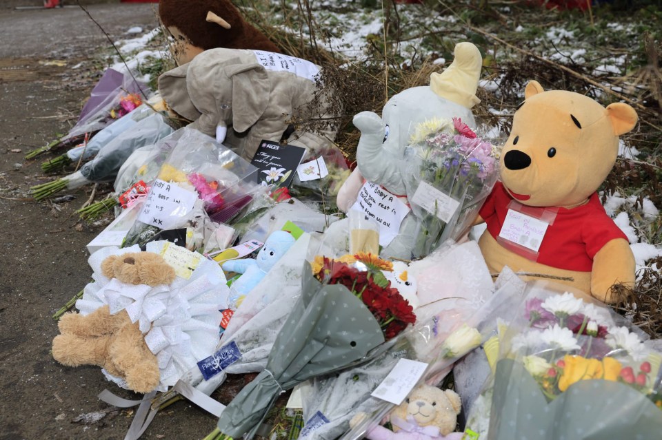 Floral tributes and stuffed animals left in memory of baby Ava.
