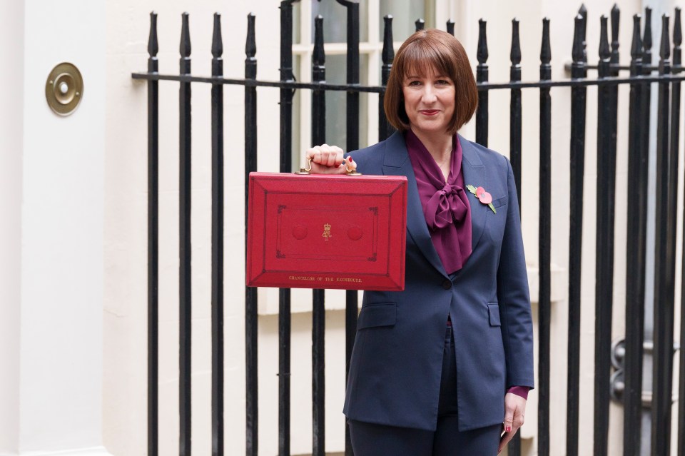 Rachel Reeves, Chancellor of the Exchequer, holding the budget box.