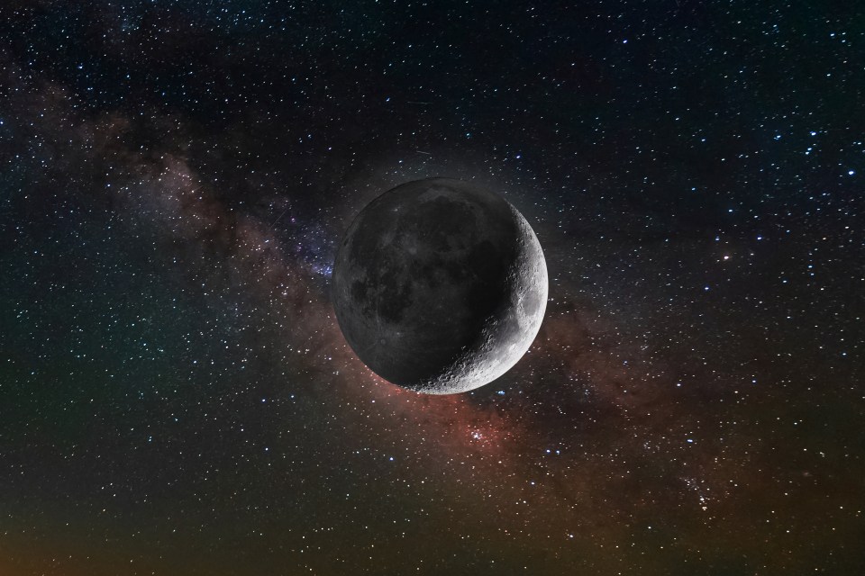 Crescent moon with the Milky Way in the background.