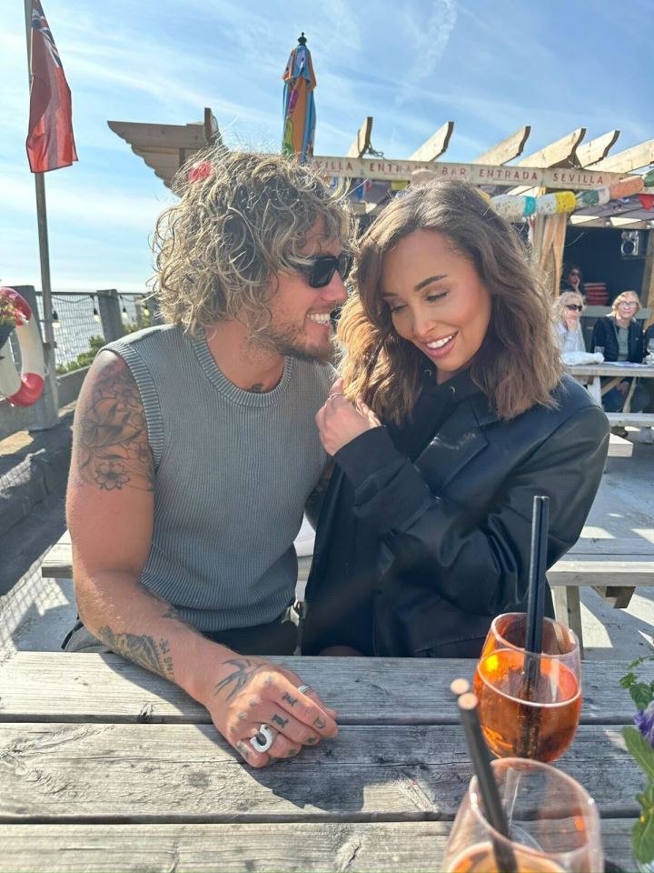 Ella Morgan and Alex, from Celebs Go Dating, sitting together at an outdoor table.