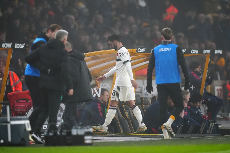 Bruno Fernandes leaves the pitch after being sent off during a soccer match.