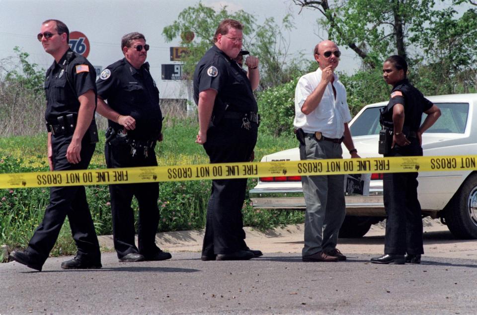 Police officers at a crime scene.