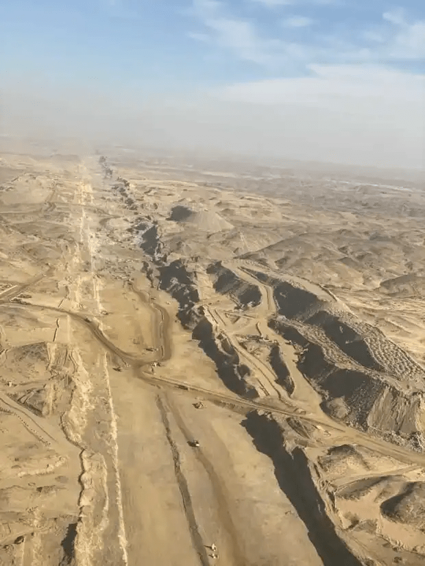 Aerial view of a large-scale mining operation.