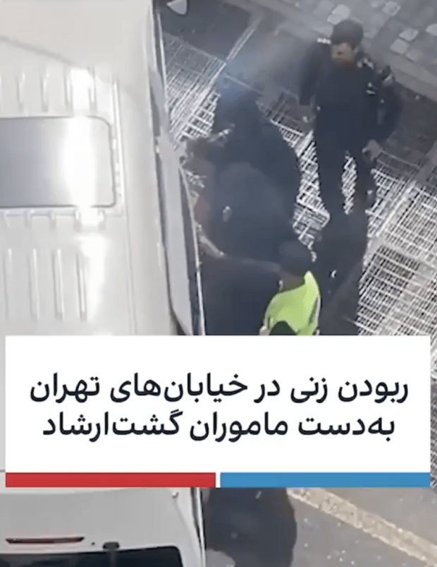Police officers arresting a suspect.