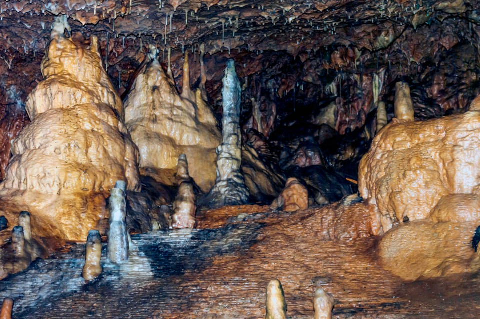 Interior of Kent's Cavern showing stalagmites and flowstone.