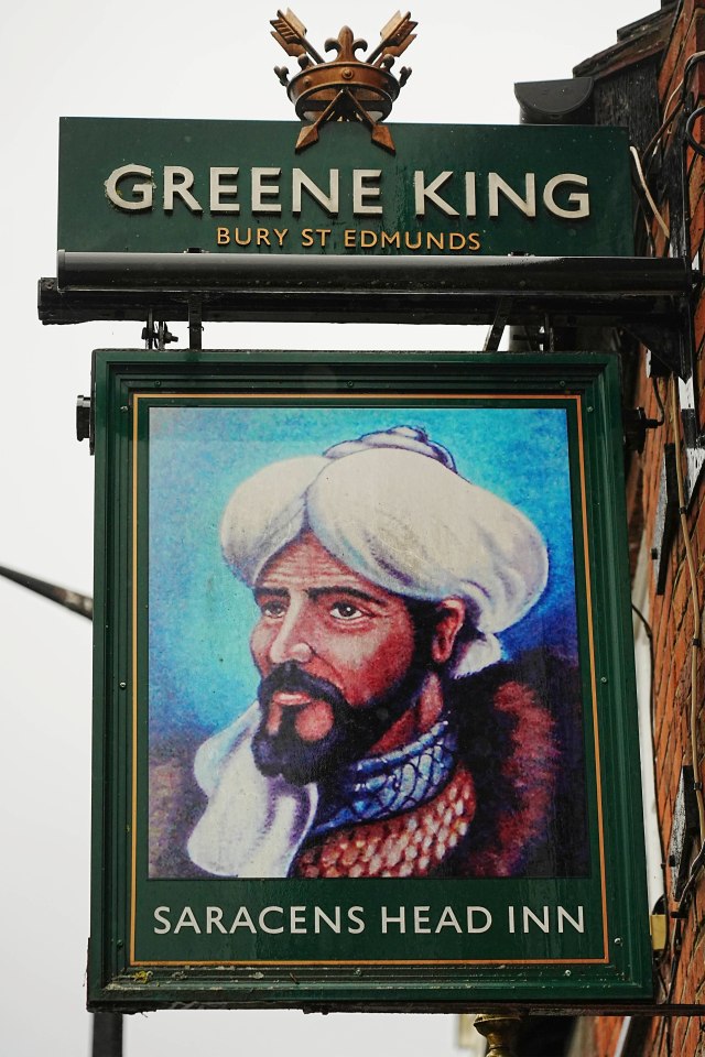 Pub sign for the Saracens Head Inn, a Greene King pub in Bury St Edmunds.