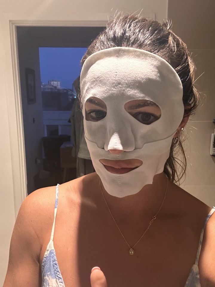 Woman wearing a sheet mask.