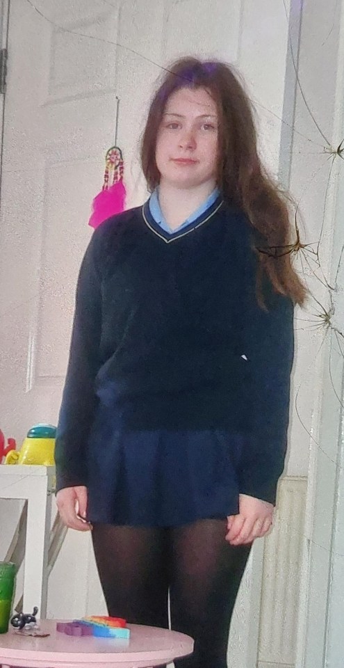 Girl in school uniform.