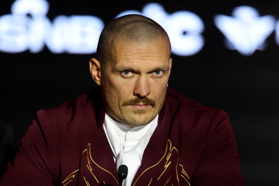 Oleksandr Usyk at a press conference before a world heavyweight title fight.