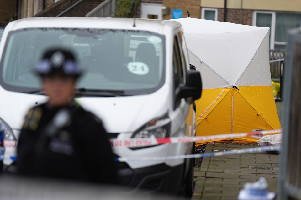 Police tent at a crime scene.