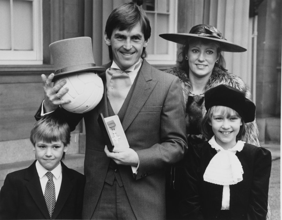 Kenny Dalglish with his family at Buckingham Palace after receiving an MBE.