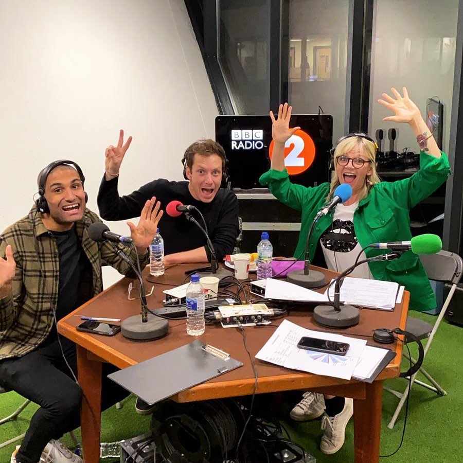 Three radio hosts at a BBC Radio 2 broadcast.