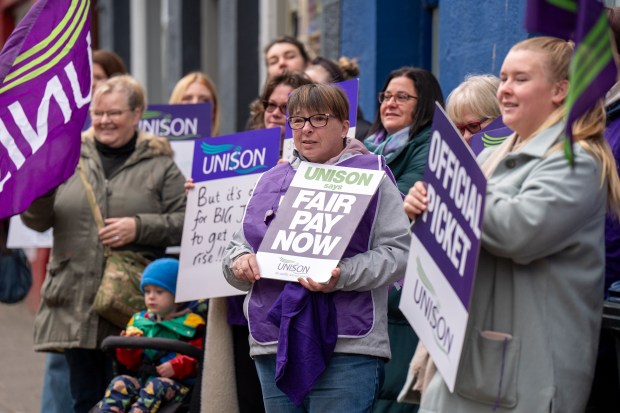 School support workers striking for fair pay.