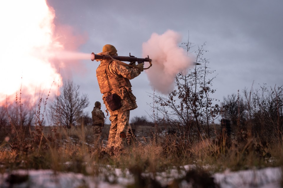 Ukrainian soldier firing an RPG during a training exercise.