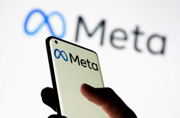 Smartphone displaying the Meta logo.