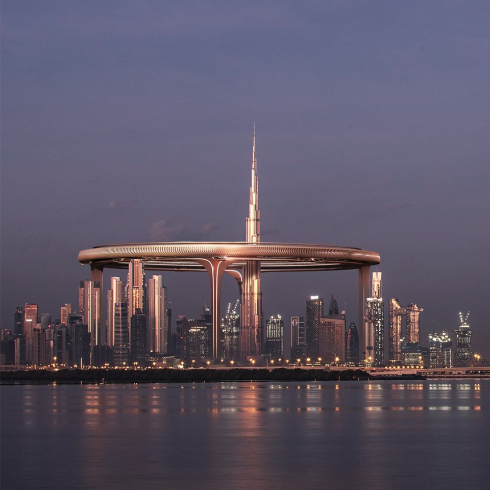 Rendering of a futuristic circular city structure surrounding the Burj Khalifa in Dubai.