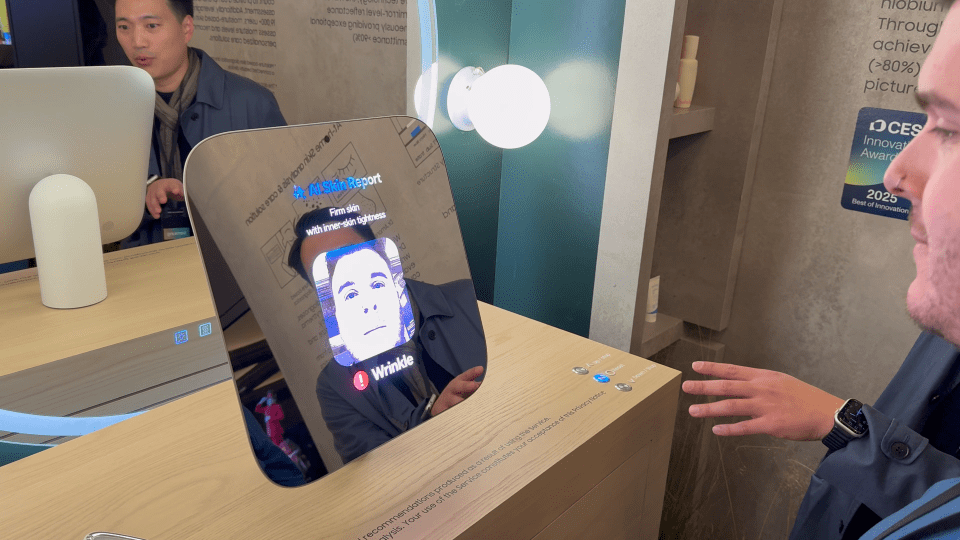 Smart mirror displaying skin analysis and wrinkle detection.