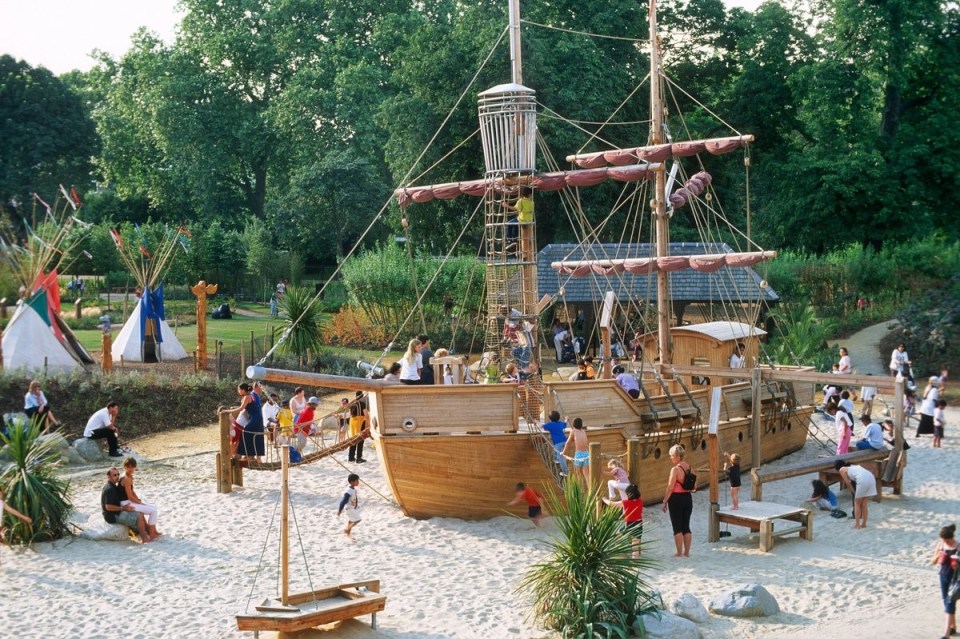 Illustration of the Diana Memorial Playground in Kensington Gardens, featuring a large wooden pirate ship play structure and other play areas.