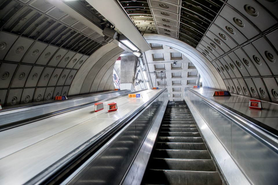 Nearly empty escalator in a London Underground station during COVID-19 lockdown.
