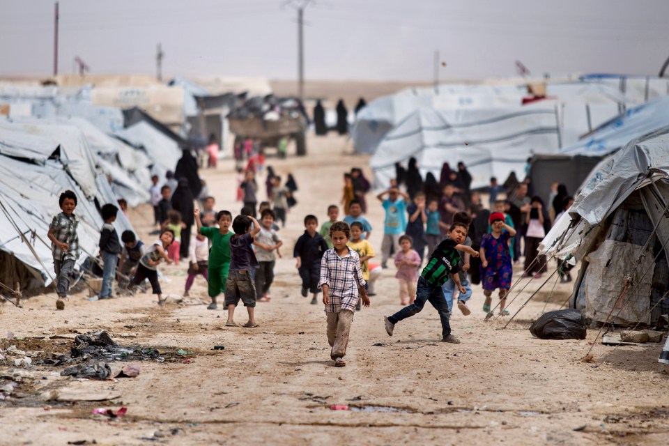 Children playing in a refugee camp.