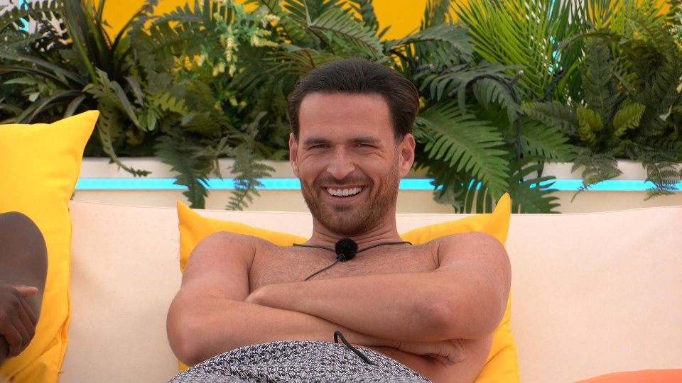 Ronnie Vint smiling on Love Island.