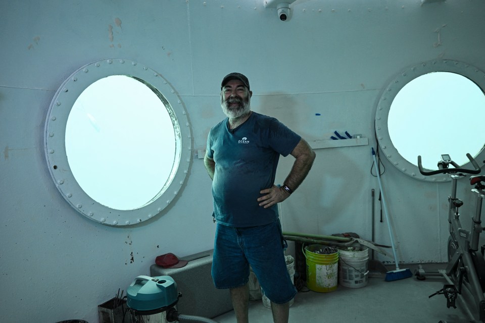 Man in underwater habitat.