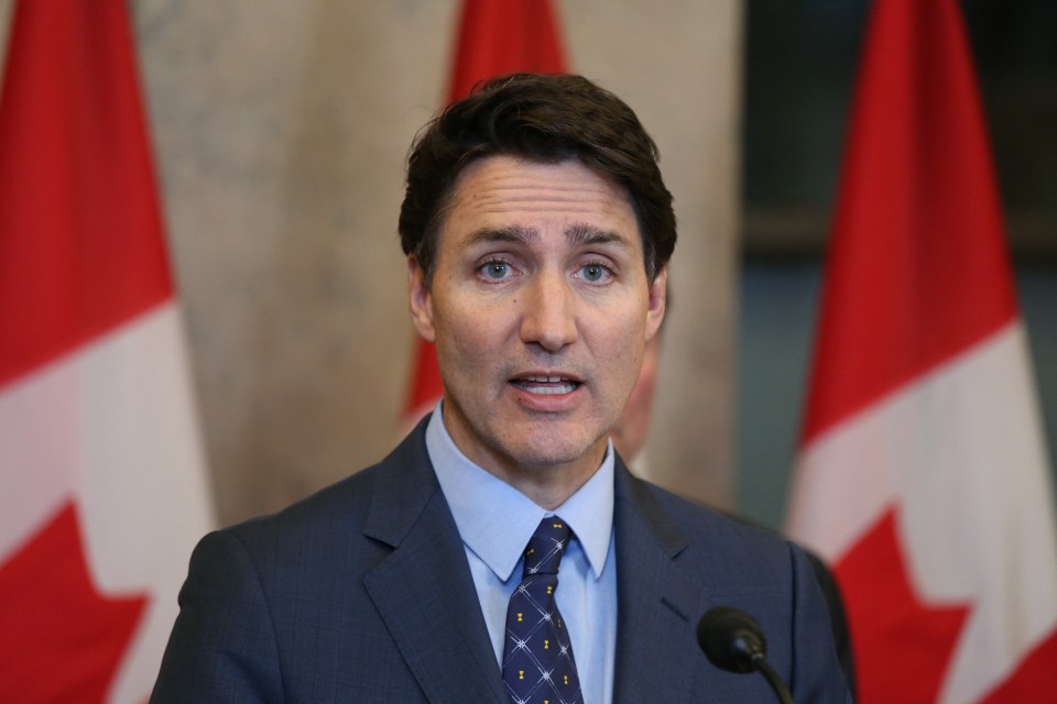 Justin Trudeau speaking at a press conference on Parliament Hill.