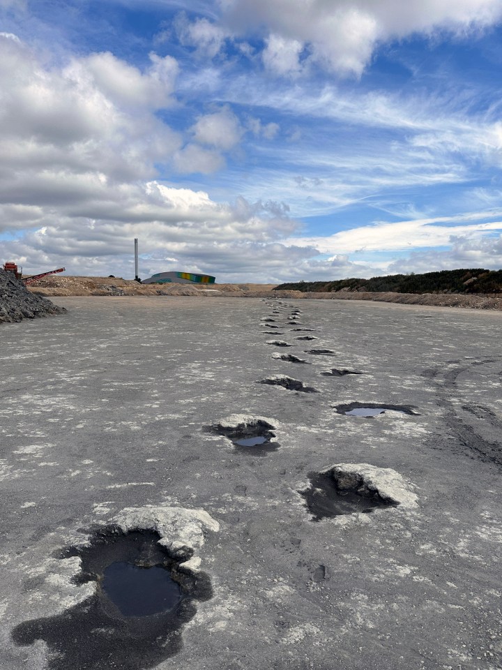 A path of potholes in a quarry.