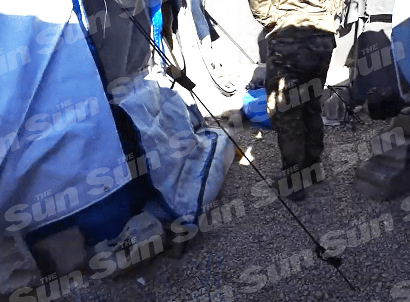 Filmmaker Alan Duncan was led to the tent by one of the camp's guards