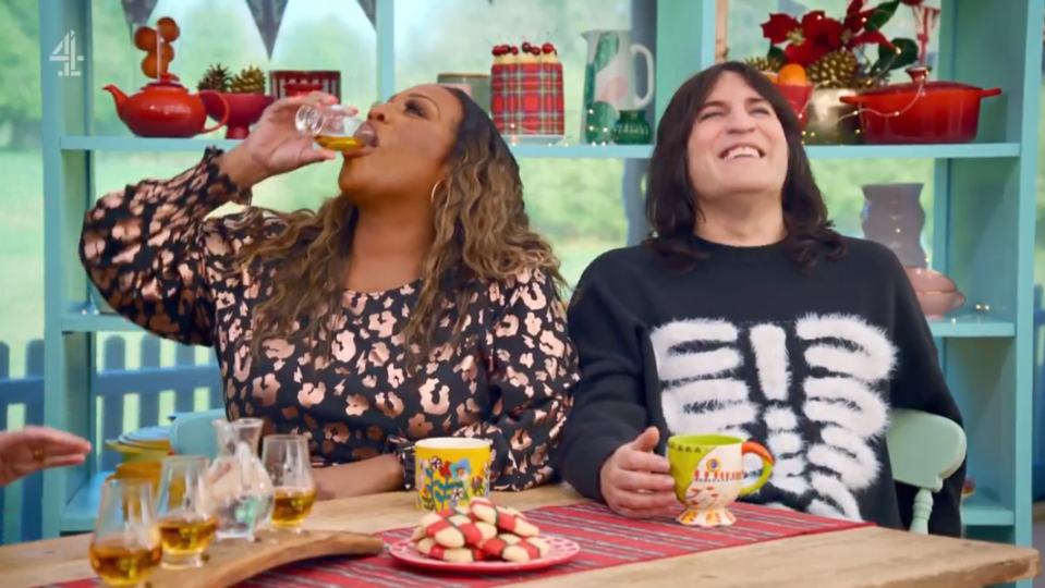 Two people tasting whisky.