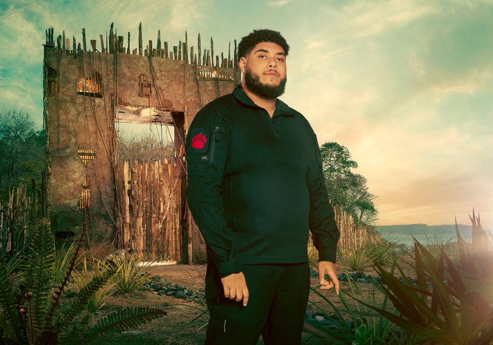 Big Zuu, TV chef and rapper, in front of a tribal-style gate.