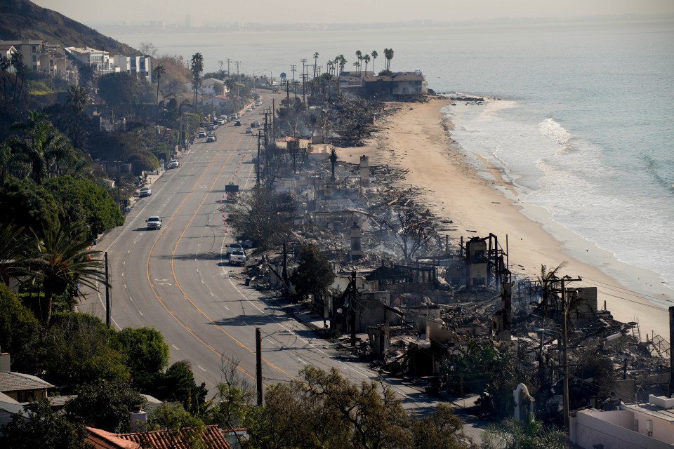 Burned-out beachfront homes after a fire.