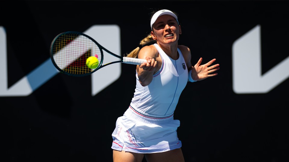 Ekaterina Alexandrova playing tennis.