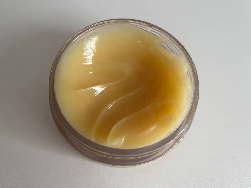 A jar of yellow balm.