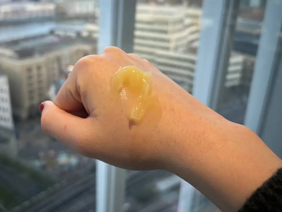 Hand with balm applied.