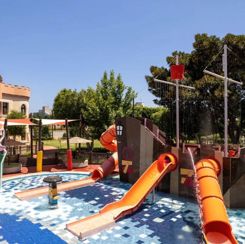 Children's water play area shaped like a pirate ship.