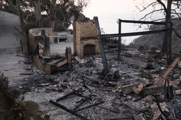 Burned-out remains of a house.