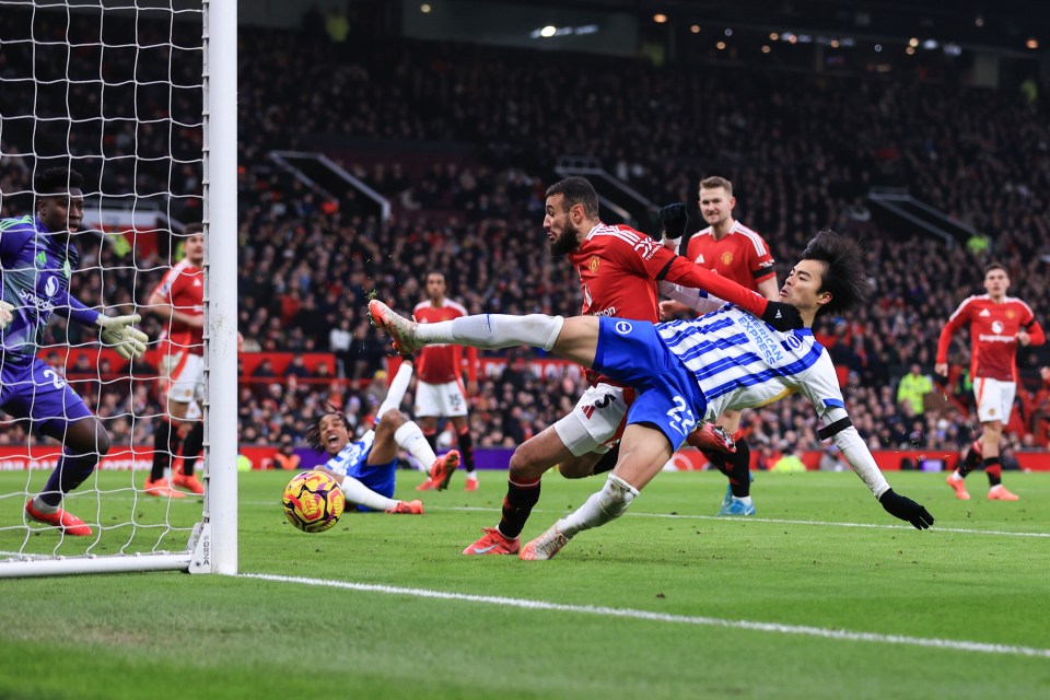 Kaoru Mitoma of Brighton scores a goal.