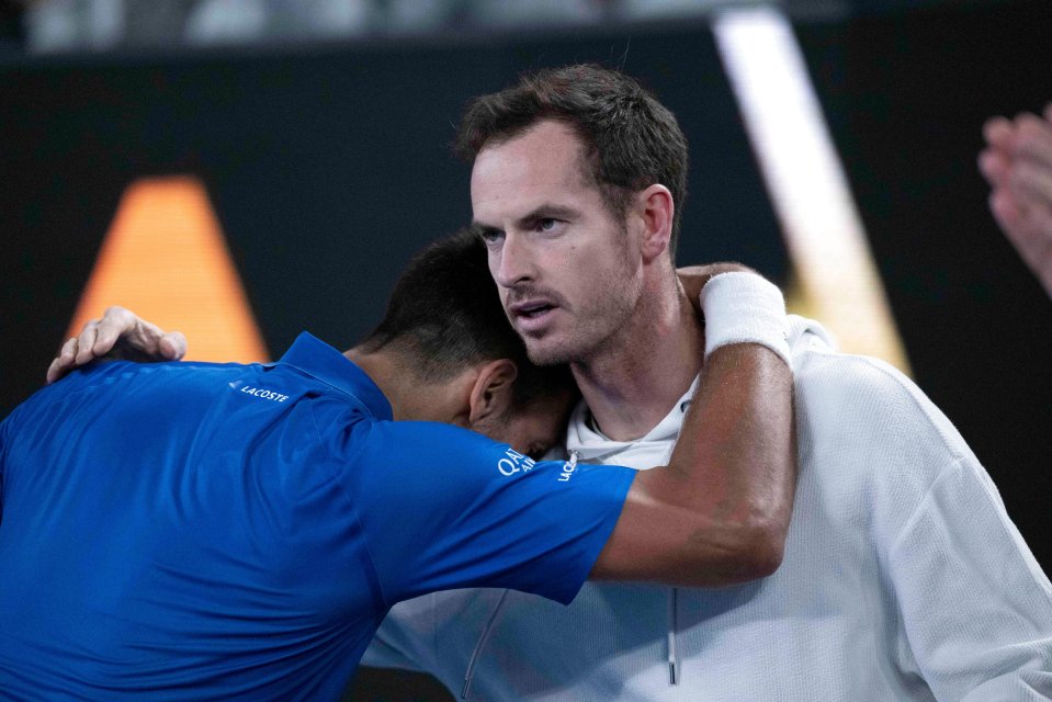 Novak Djokovic hugging his coach Andy Murray after a tennis match.