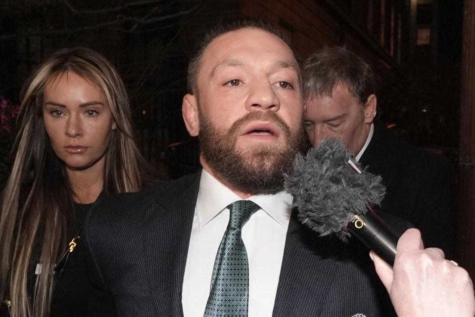 Conor McGregor and Dee Devlin leaving the High Court in Dublin.