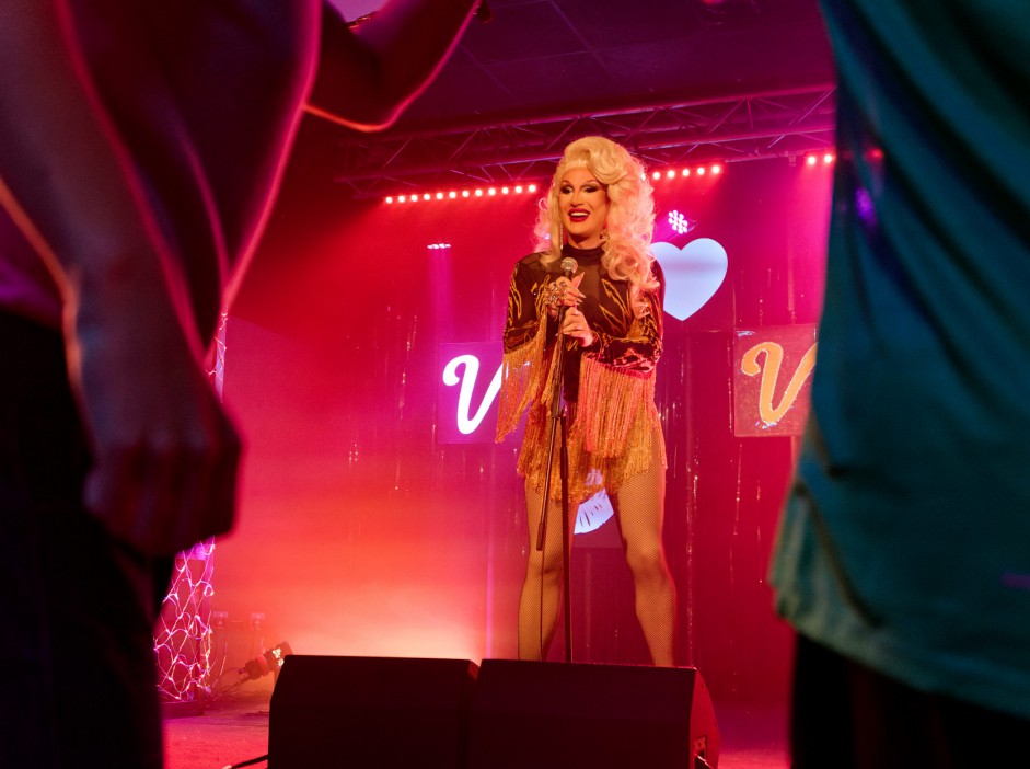 Drag queen The Vivienne performing on stage.